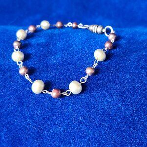 Elegant Magenta & Cream Beaded Bracelet